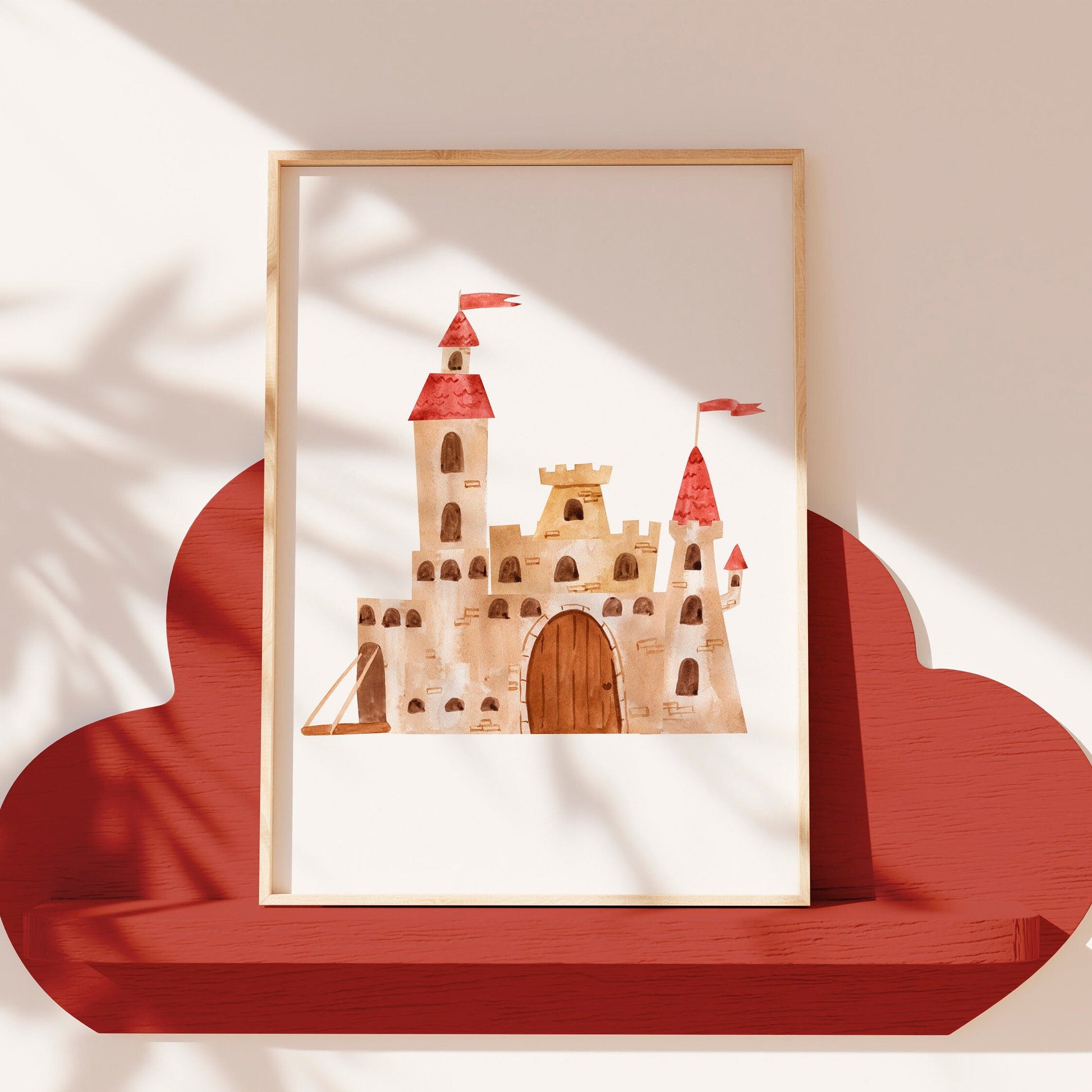 Poster Schloss A4 & A3: Aquarell Schloss, ideal für Kinderzimmerdeko, auf hochwertigem 300g Naturpapier gedruckt. Gerahmt auf einem roten Holzregal.