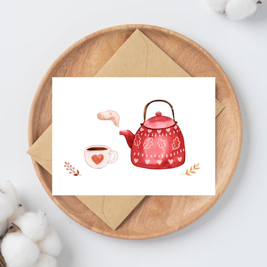 Karte Tea Time A6 mit Aquarell-Teekanne und Tasse auf Holztablett, begleitet von Baumwollzweigen. Ideal als Grußkarte oder Einladung für Teeliebhaber.