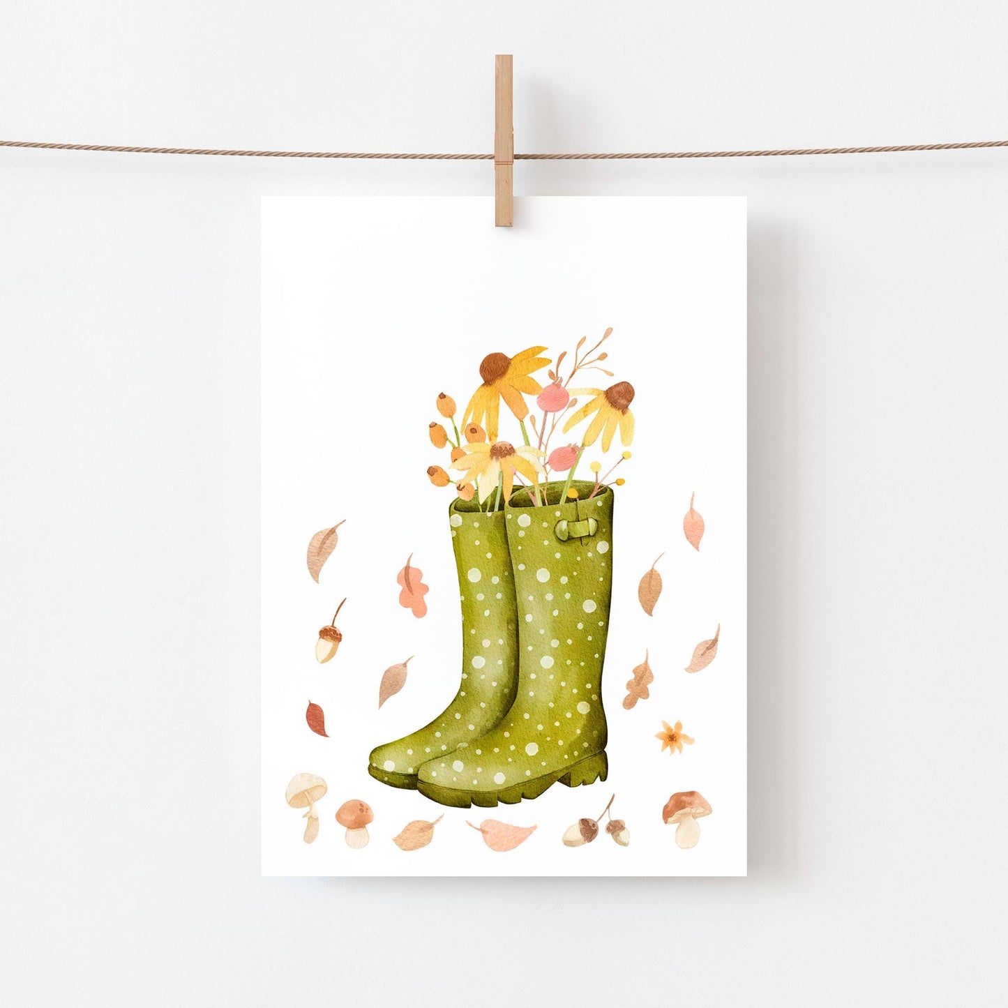Postkarte Karte Herbstblumen A6 mit grünen Gummistiefeln voller Herbstblumen an einer Schnur aufgehängt, gedruckt auf hochwertigem, mattem Naturpapier.