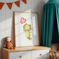 Poster Frosch & Ballon A3 & A4 zeigt einen fröhlichen Frosch mit Ballon. Gedruckt auf hochwertigem, mattem Naturpapier, ideal für Kinderzimmer.